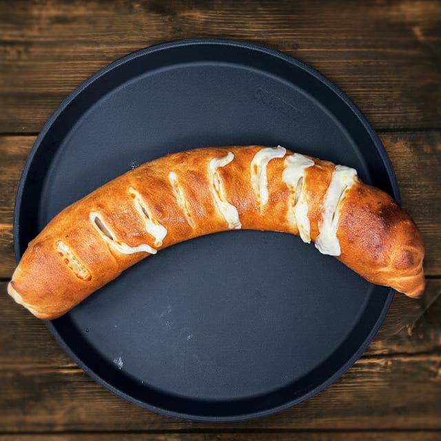 Pepperoni, Ham & Cheese Stromboli Large.